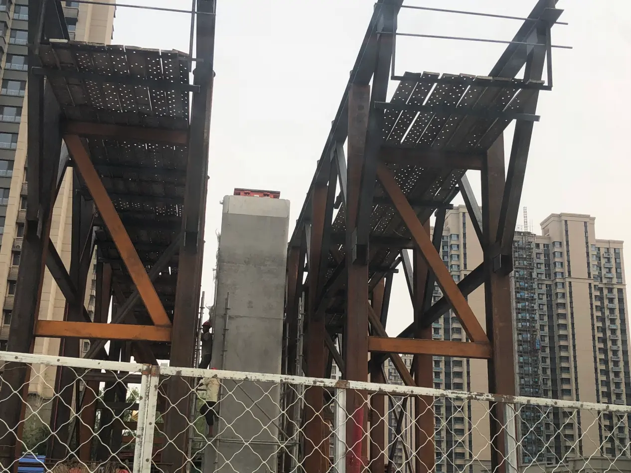 Finished structural steel sections being handled in the SD XJY Pipe manufacturing shop